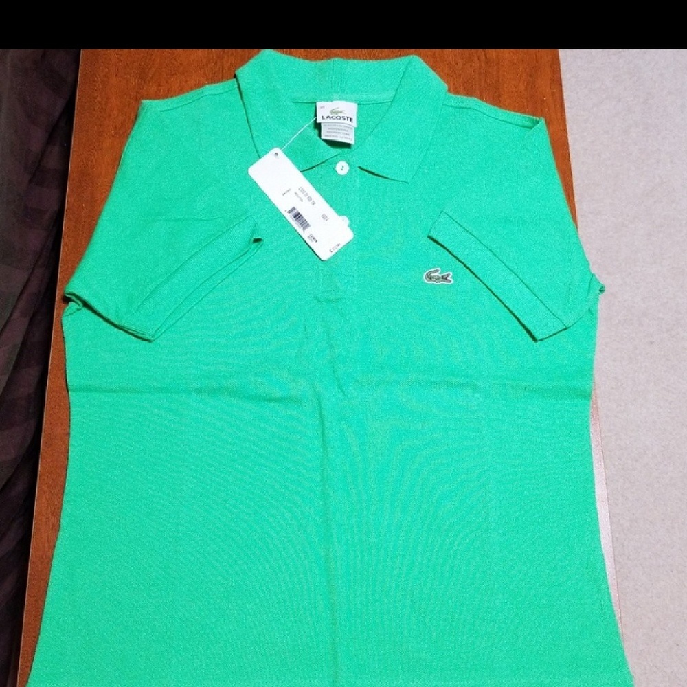 Woman's Lacoste Poli NWT Size 4 36